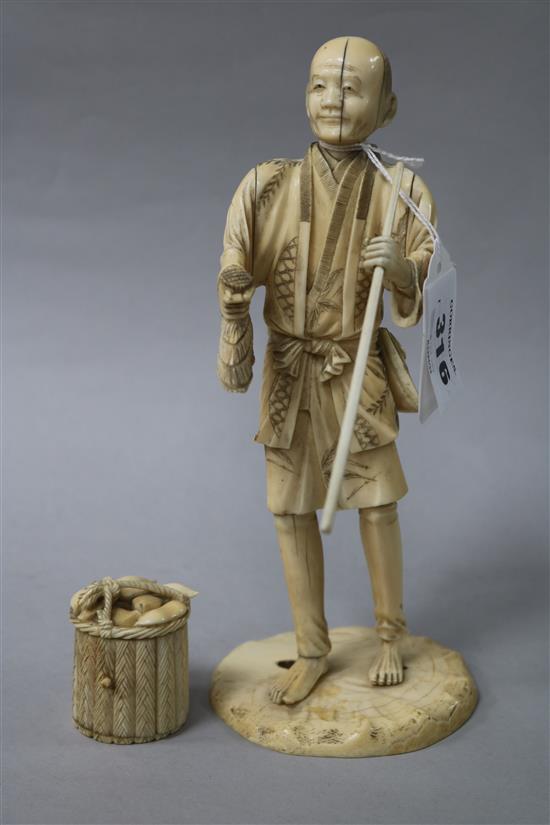 A Japanese sectional ivory figure of a farmer